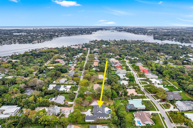 aerial view featuring a water view and a residential view