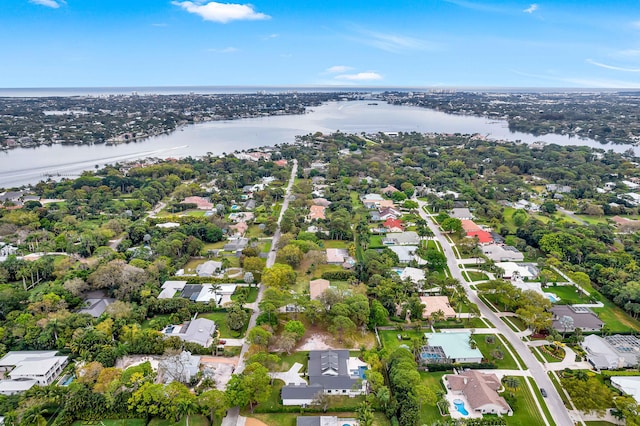 aerial view with a residential view and a water view