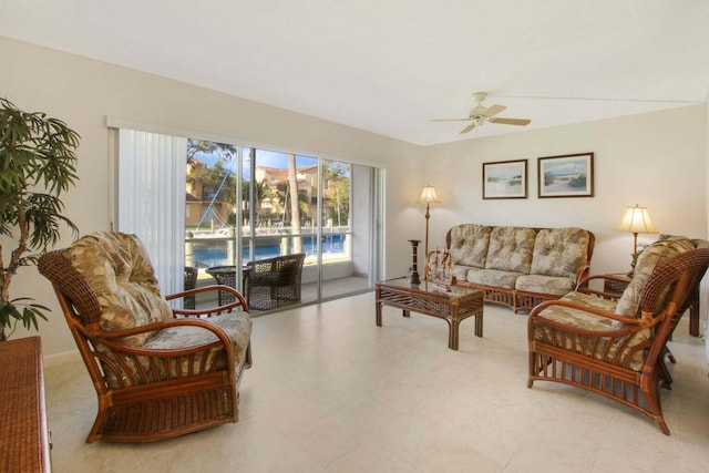 living area featuring ceiling fan