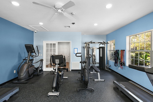 gym featuring attic access, visible vents, baseboards, and recessed lighting