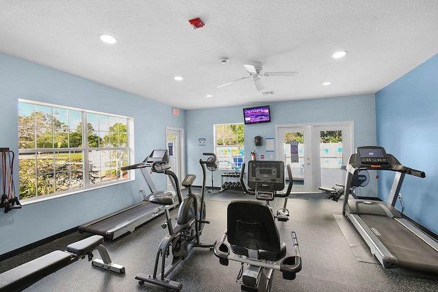 interior space featuring a textured ceiling, french doors, a ceiling fan, and recessed lighting