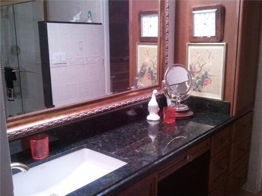 2424 N Federal Hwy Unit 106, Boynton Beach, FL 33435 - room details with vanity