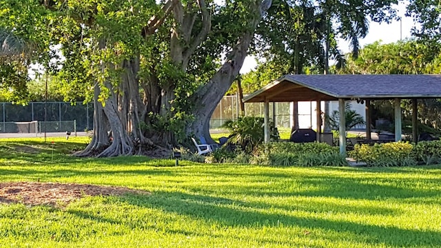 2424 N Federal Hwy Unit 106, Boynton Beach, FL 33435 - view of yard featuring fence