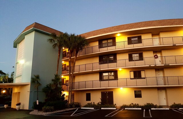 2424 N Federal Hwy Unit 106, Boynton Beach, FL 33435 - view of property featuring uncovered parking
