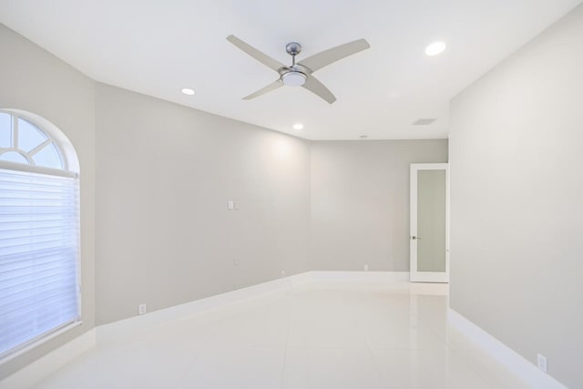 unfurnished room featuring light tile patterned floors, a ceiling fan, and recessed lighting