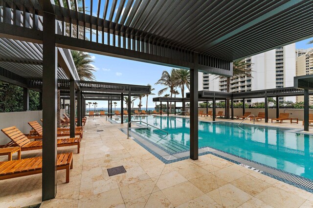 community pool with a patio