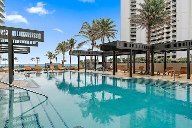 pool with a patio area