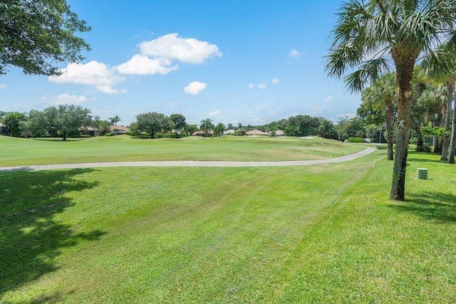 view of home's community featuring a lawn