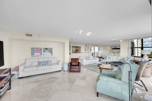 living room featuring visible vents