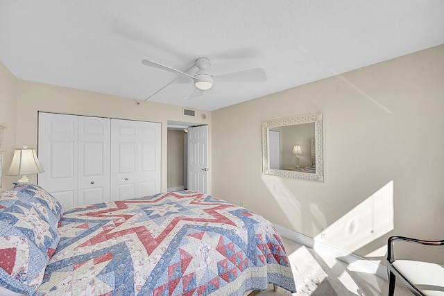 bedroom featuring carpet, a closet, visible vents, ceiling fan, and baseboards