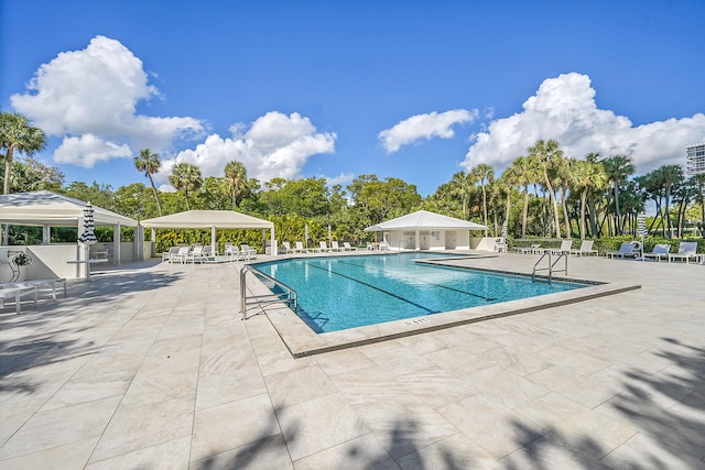 pool with a patio