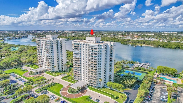 birds eye view of property featuring a water view