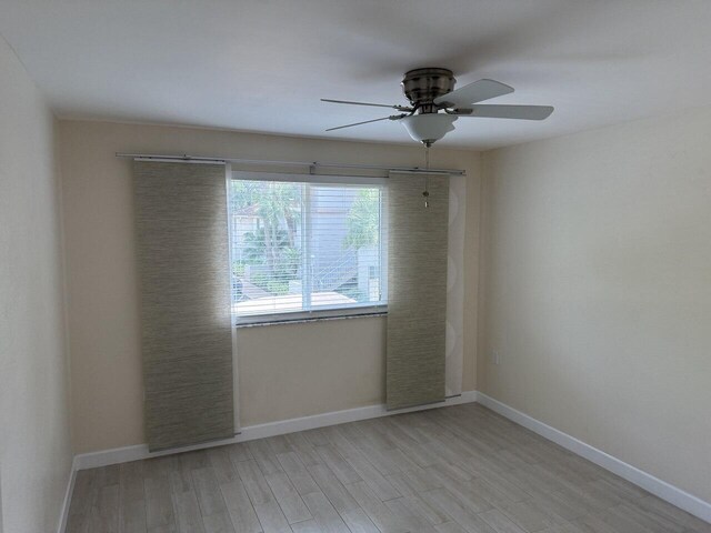 spacious closet with wood finished floors