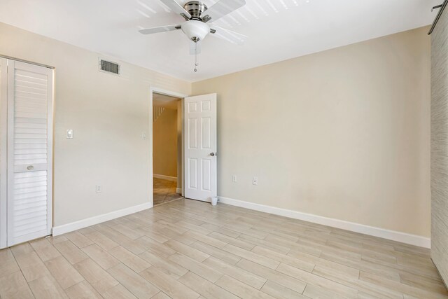 19203 Glenmoor Dr, West Palm Beach, FL 33409 - spare room with a ceiling fan and light wood finished floors
