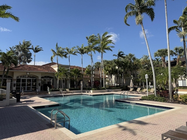 pool featuring a patio area