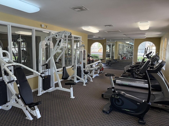 workout area featuring visible vents