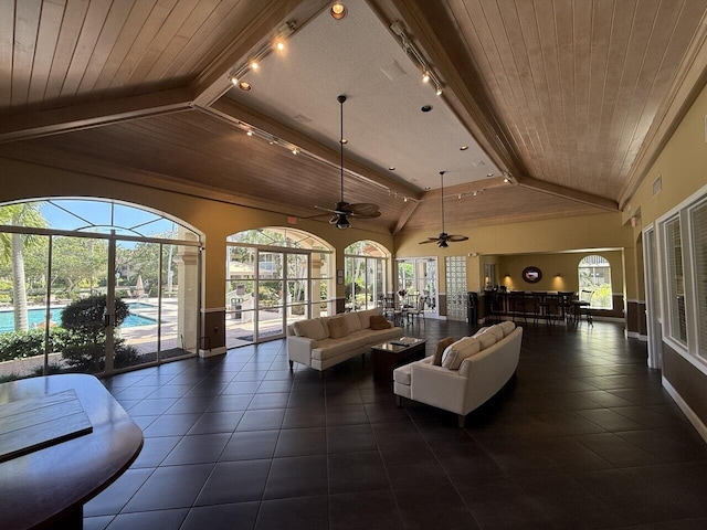 19203 Glenmoor Dr, West Palm Beach, FL 33409 - living area featuring rail lighting, ceiling fan, wooden ceiling, and dark tile patterned flooring