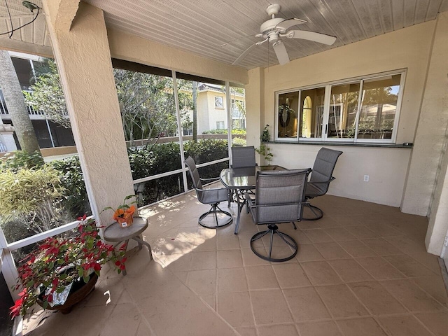19203 Glenmoor Dr, West Palm Beach, FL 33409 - sunroom / solarium with a ceiling fan and outdoor dining area