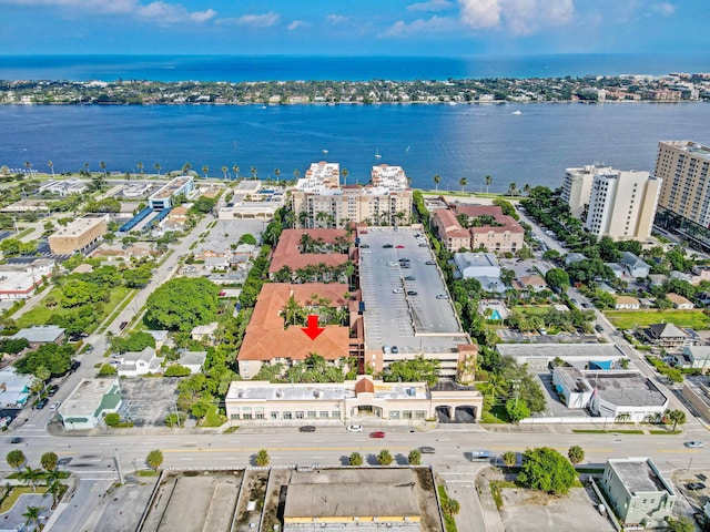 birds eye view of property with a water view