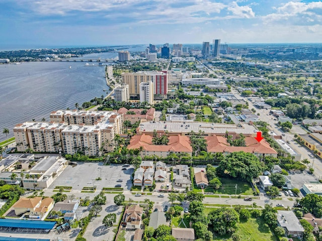 aerial view featuring a water view and a city view