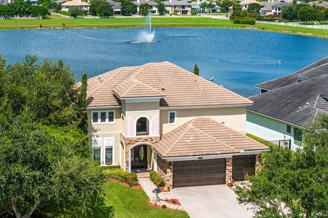 exterior space with a water view