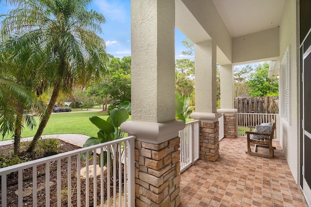 10617 Pine Cone Ln, Fort Pierce, FL 34945 - view of patio / terrace with covered porch