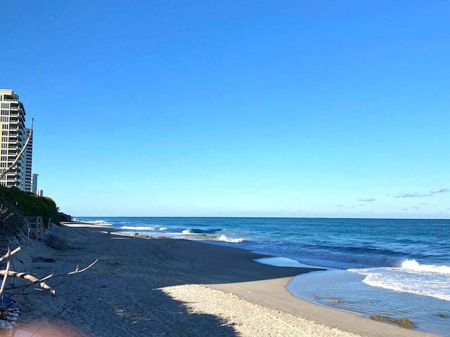 property view of water with a beach view