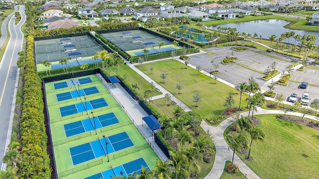 aerial view featuring a residential view and a water view