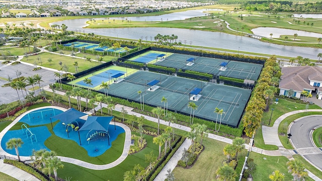 birds eye view of property featuring a residential view and a water view