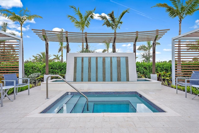 view of swimming pool with a pergola and an in ground hot tub