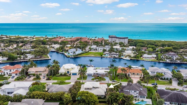 aerial view with a water view and a residential view