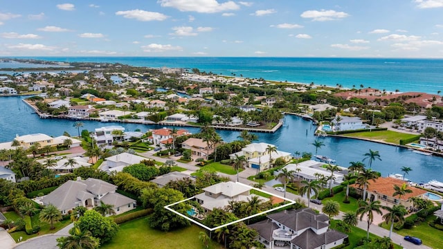 bird's eye view with a water view and a residential view