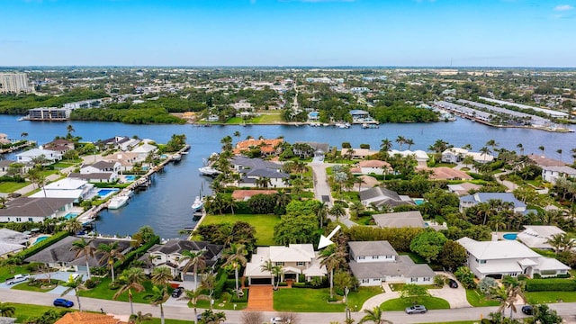 aerial view with a water view and a residential view