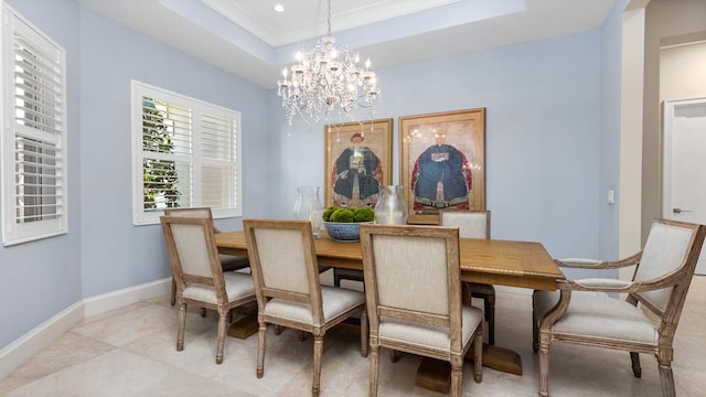 dining space with light tile patterned floors, baseboards, a tray ceiling, a chandelier, and recessed lighting