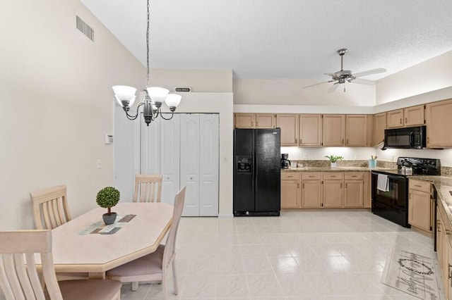 kitchen with visible vents, lofted ceiling, black appliances, light brown cabinets, and ceiling fan with notable chandelier