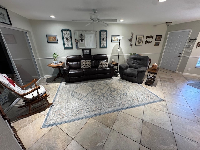 tiled living room with baseboards, a ceiling fan, and recessed lighting