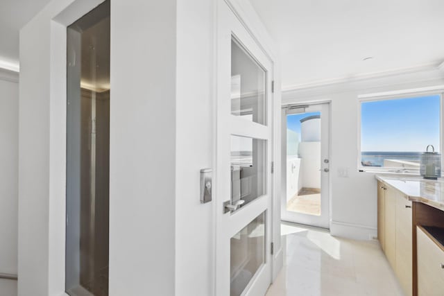 interior space with vanity and tile patterned flooring