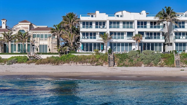 property view of water featuring a beach view