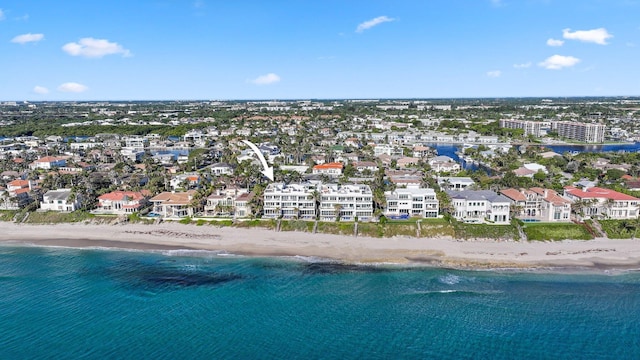 bird's eye view with a view of the beach and a water view