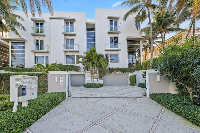 view of property with driveway