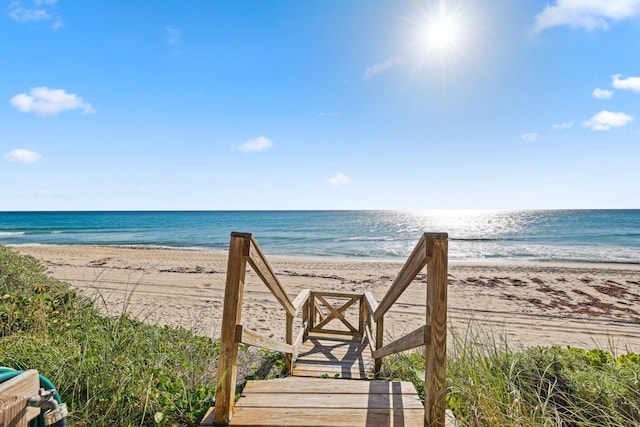 view of water feature with a beach view