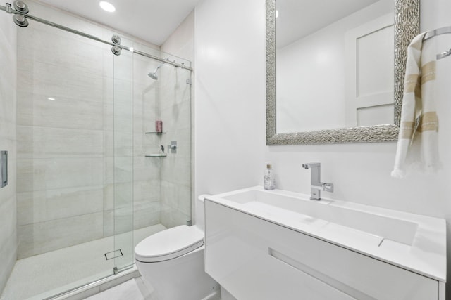 full bath featuring vanity, toilet, recessed lighting, and a stall shower