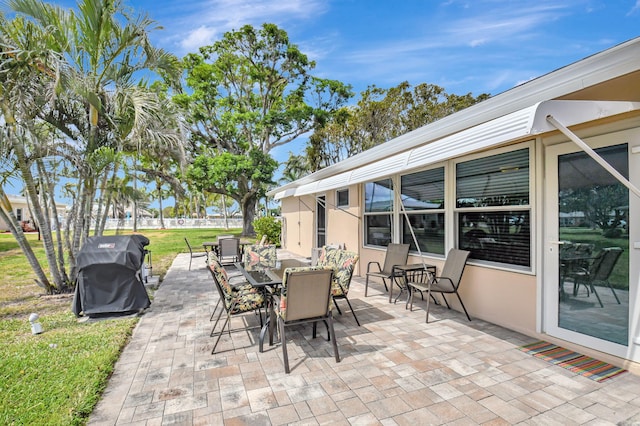 view of patio / terrace featuring outdoor dining area and area for grilling