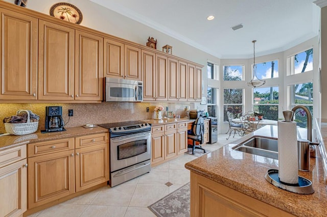 kitchen with decorative backsplash, visible vents, stainless steel appliances, and crown molding