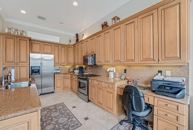 kitchen with crown molding, appliances with stainless steel finishes, tasteful backsplash, and a sink