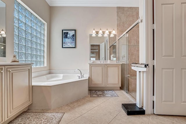 bathroom with tile patterned floors, a shower stall, a bath, and crown molding