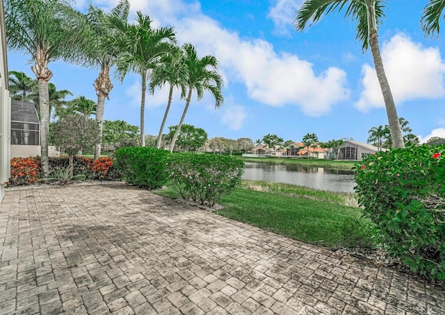 view of patio featuring a water view