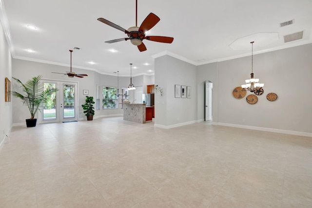 unfurnished living room with visible vents, baseboards, and crown molding