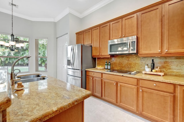 kitchen featuring stainless steel appliances, visible vents, backsplash, ornamental molding, and a sink