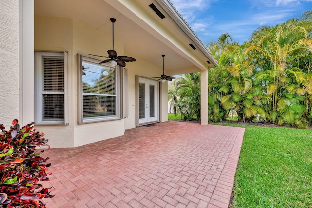 view of patio / terrace featuring ceiling fan and french doors